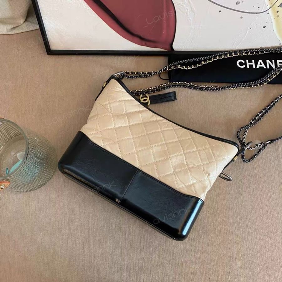 CHANEL 米色拼黑色 中號流浪包-1
