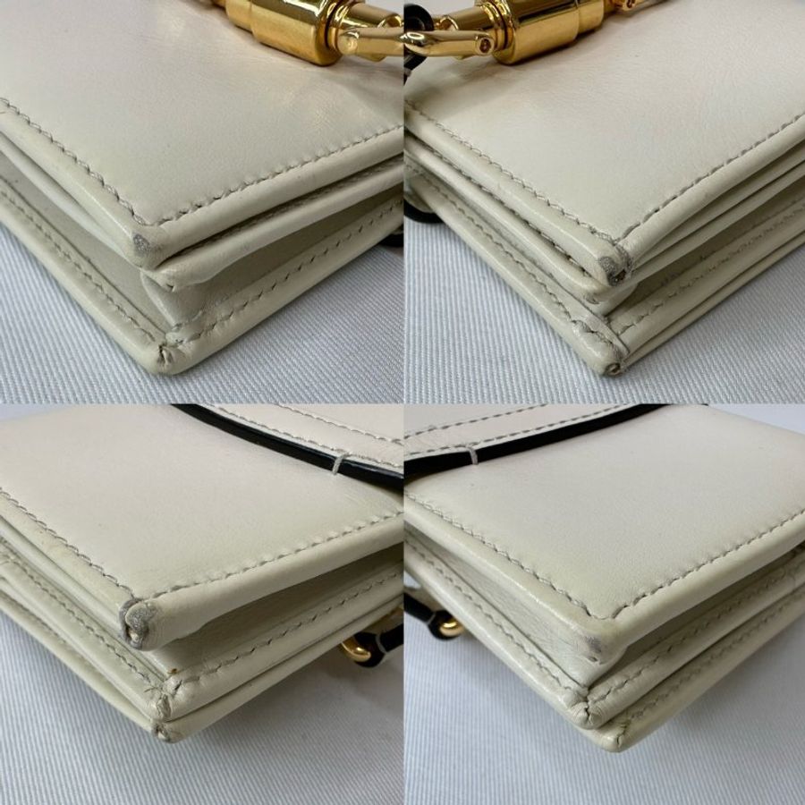 GUCCI Jackie 1961象牙白短夾-10