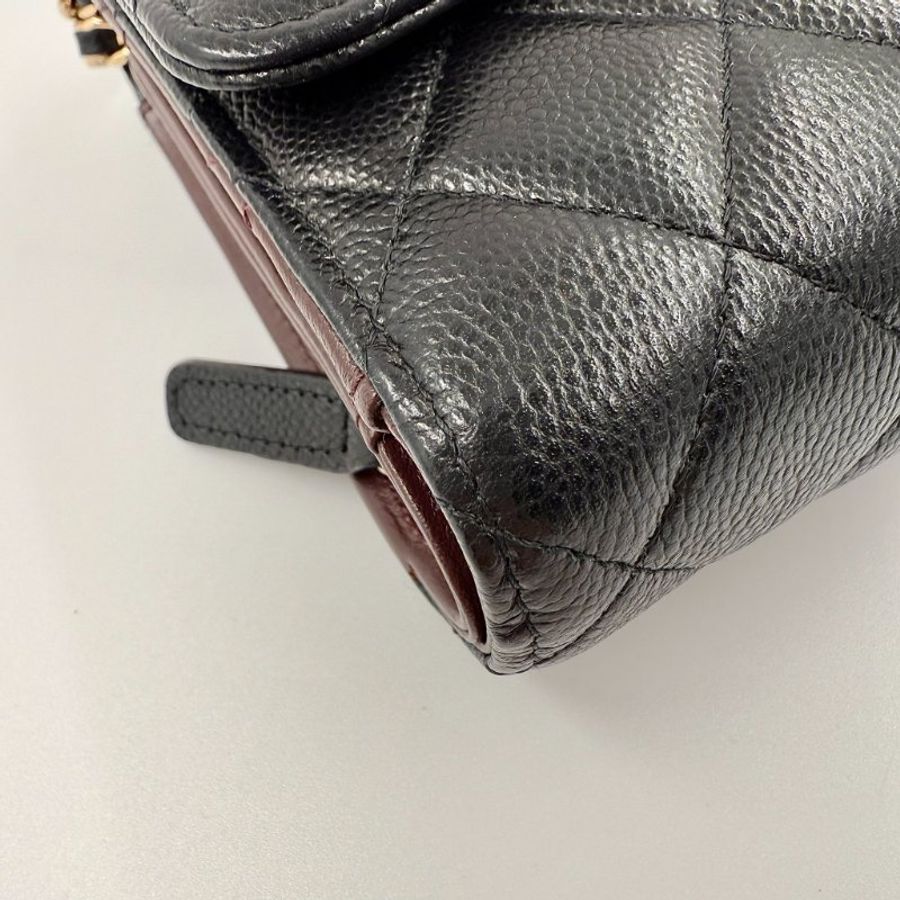 CHANEL-黑色淡金釦牛皮三折WOC-5