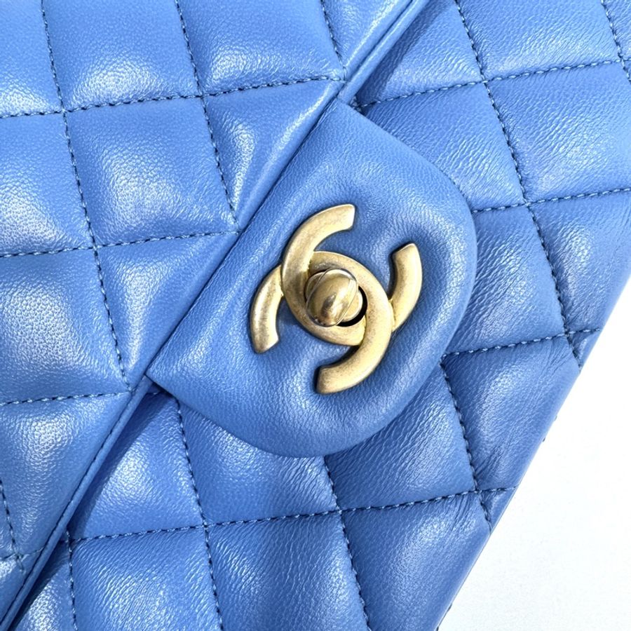 Chanel天空藍金釦羊皮COCO 25CM A01112-13