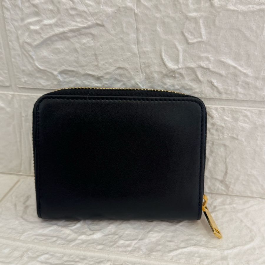 Celine 黑皮革凱旋門ㄇ拉零錢包👛-1