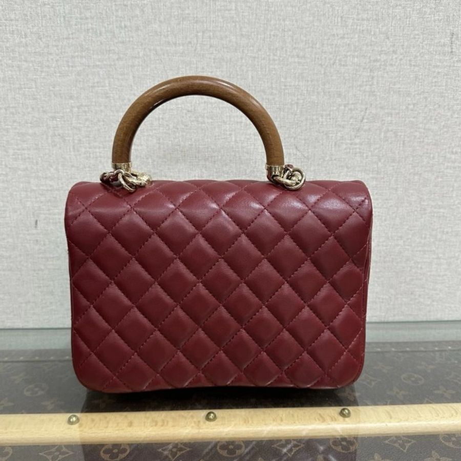CHANEL 酒紅色木紋手柄方胖子手提包 22*7*15 99新配件塵袋-5