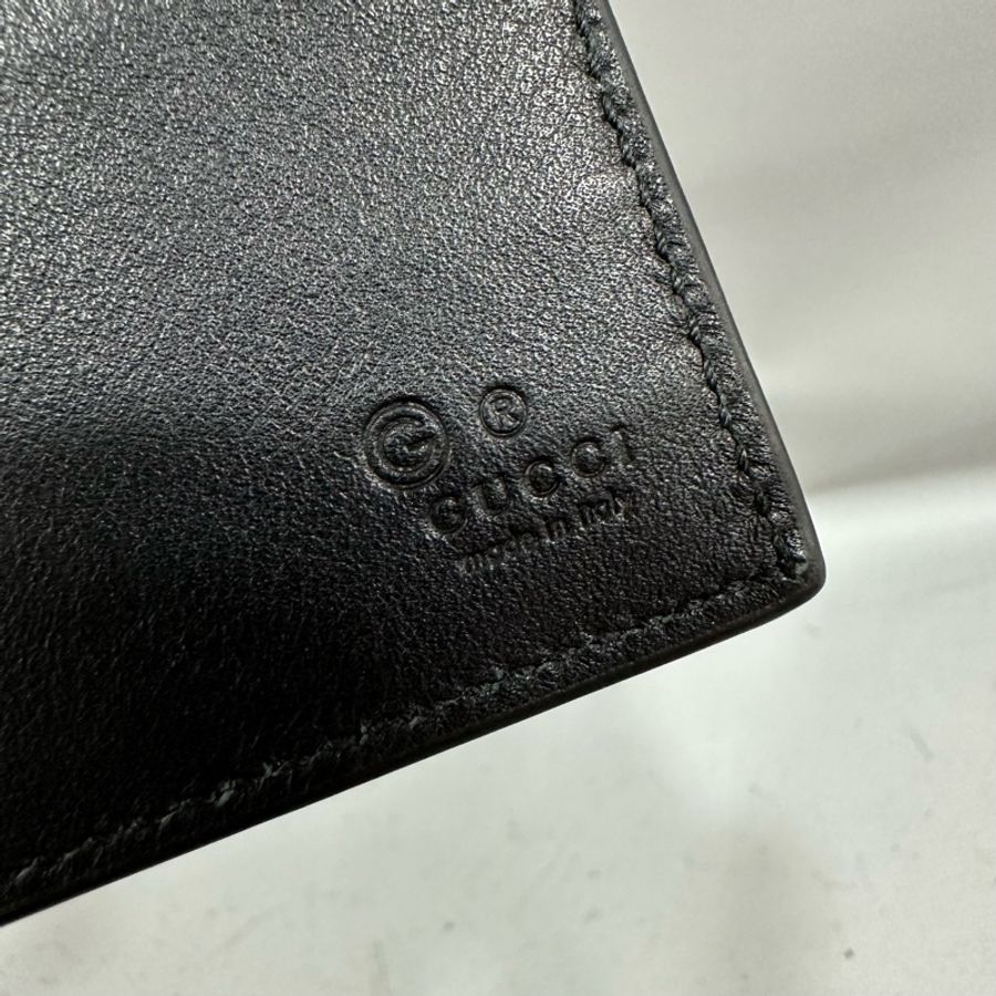 Gucci 260987 黑色牛皮壓紋GG短夾-9