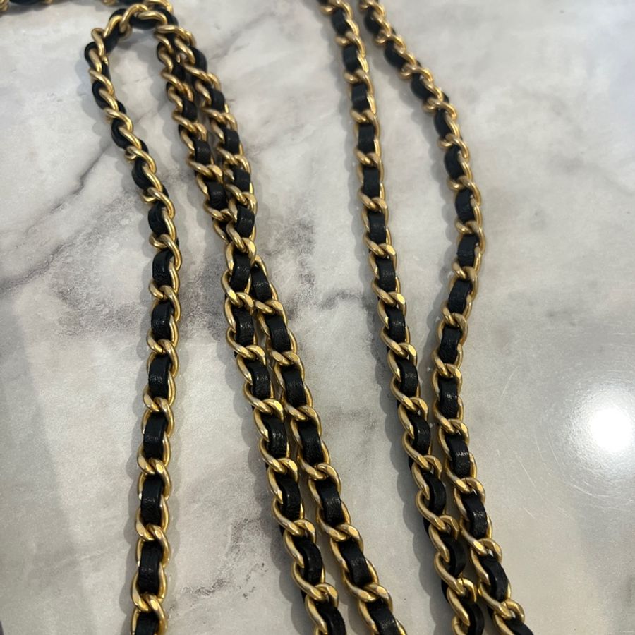 Chanel 黑牛皮霧金釦Boy WOC. A83222-16