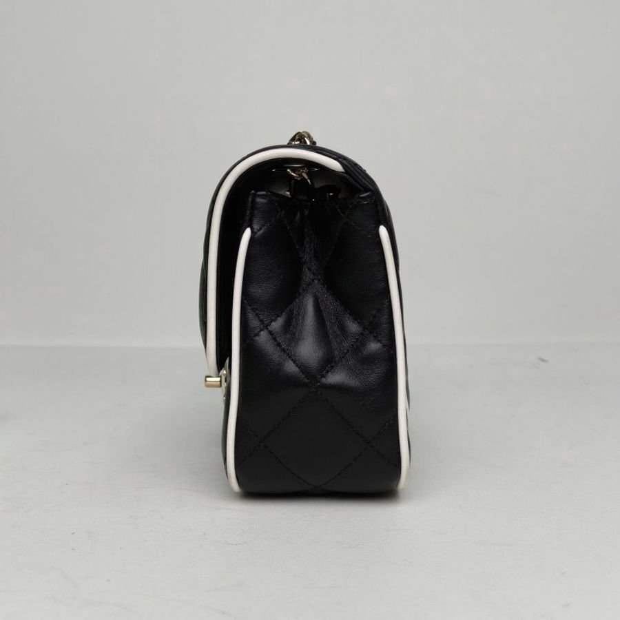 CHANEL CF25P漫畫系列/20黑白羊皮晶片開淺金扣肩背包-1