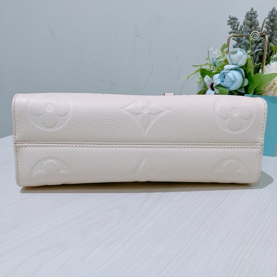 TK1886 Louis Vuitton 路易威登奶昔白手提/斜挎包On The Go East West Monogram Empreinte Cream X GHW-28