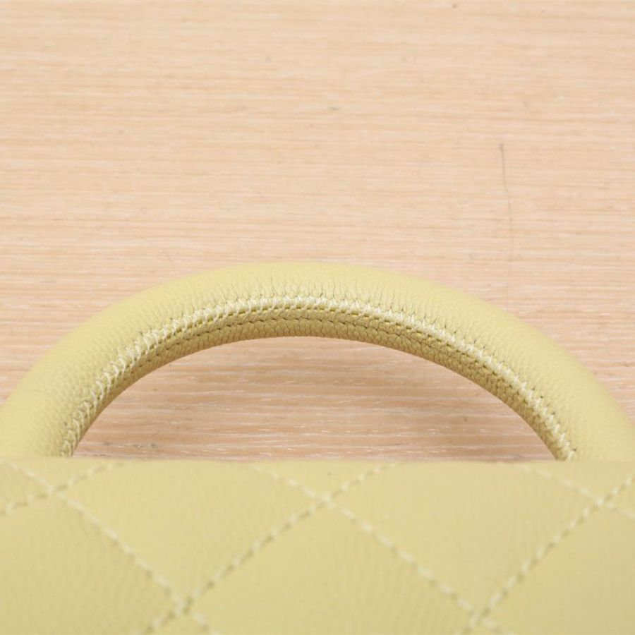 CHANEL CocoHandleMini19黃色荔枝牛皮30開黃扣肩背包-2