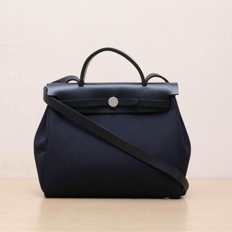 HERMES Herbag3189黑色帆布/Hunter牛皮U刻銀扣肩背包-1