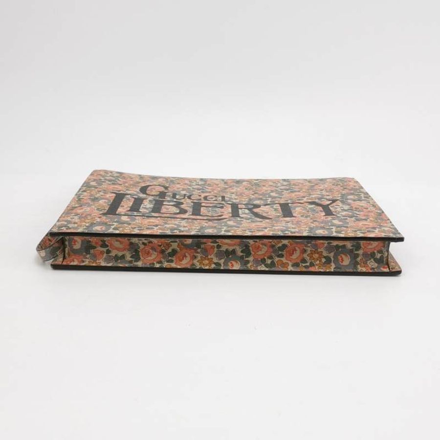 Gucci牛皮花卉滿印字母Logo拉鏈手拿包-4
