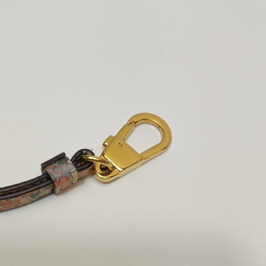 Gucci牛皮花卉滿印字母Logo拉鏈手拿包-12