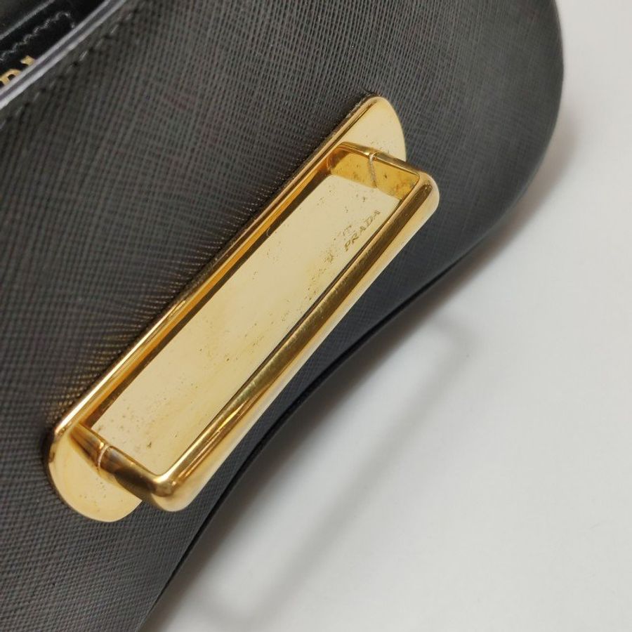 Prada Sidonie牛皮純色字母logo書封式插扣單肩包-9