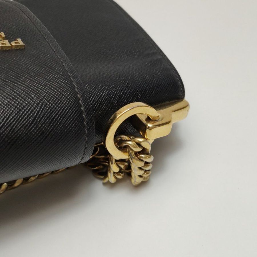 Prada Sidonie牛皮純色字母logo書封式插扣單肩包-10