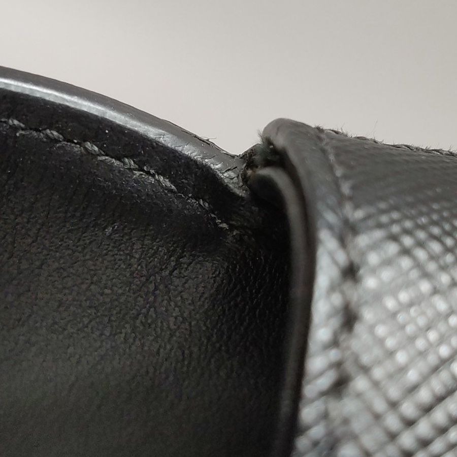 Prada Sidonie牛皮純色字母logo書封式插扣單肩包-12