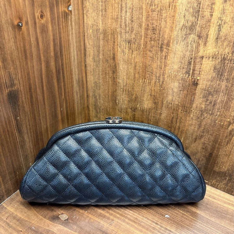 Chanel 黑色菱格紋手拿包-0