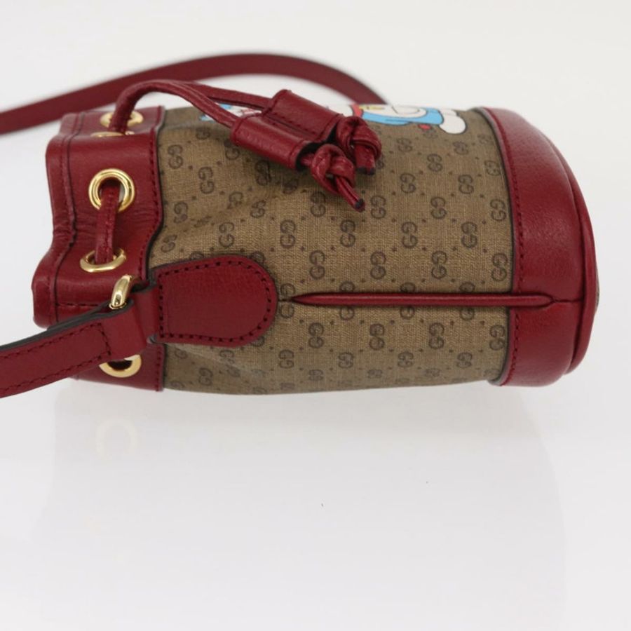 【日本直送】GUCCI Micro GG Supreme哆啦A夢肩包 PVC 米色 金色 647801 正品 161141SM-3