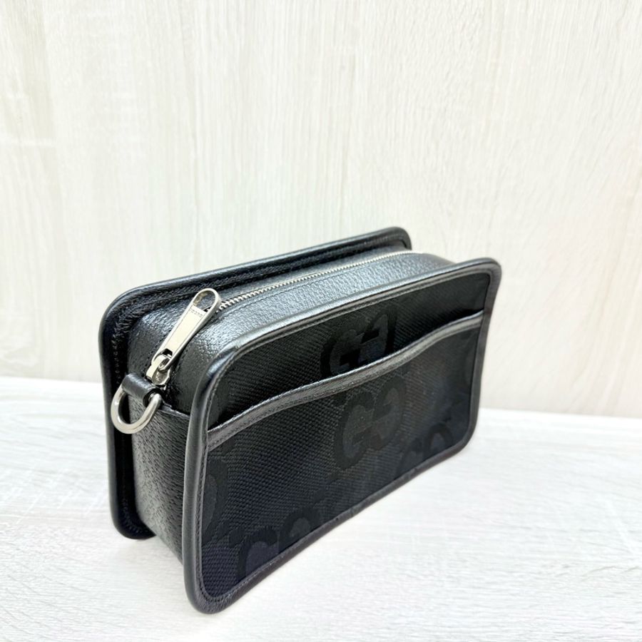 GUCCI黑色帆布拚皮革JUMBO GG拉鍊相機包696075-4