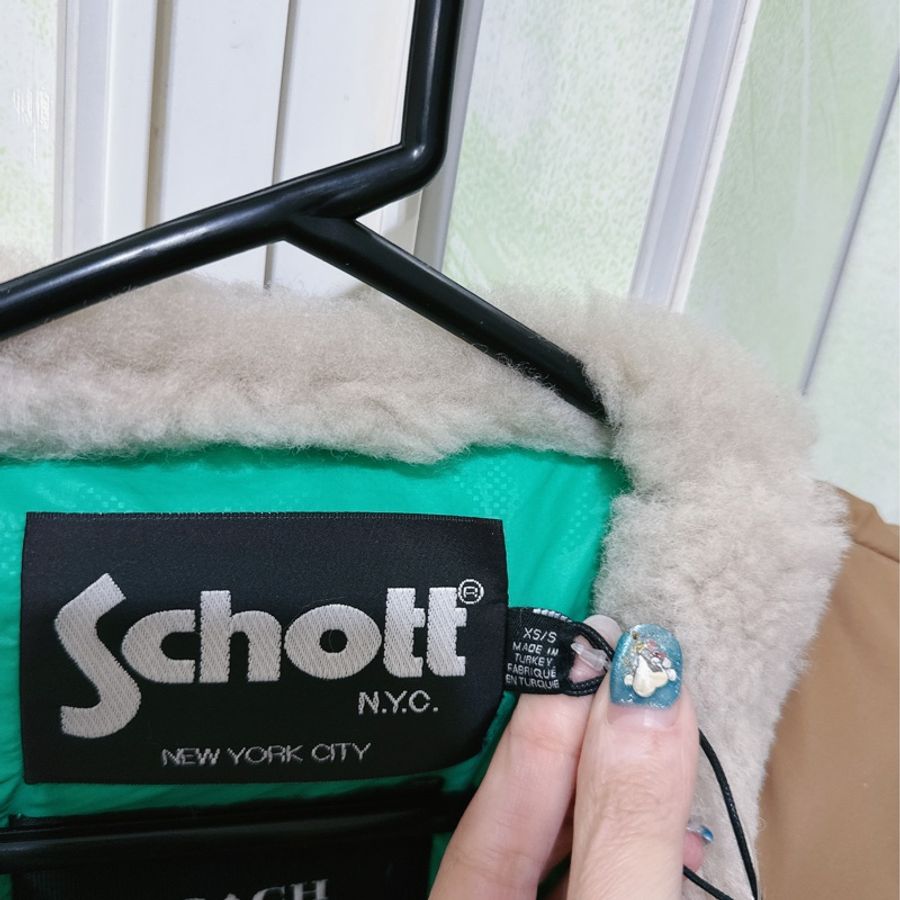 未使用Coach 與 Schott N.Y.C. 的聯名款尼龍羽絨背心(原價41800元）-8