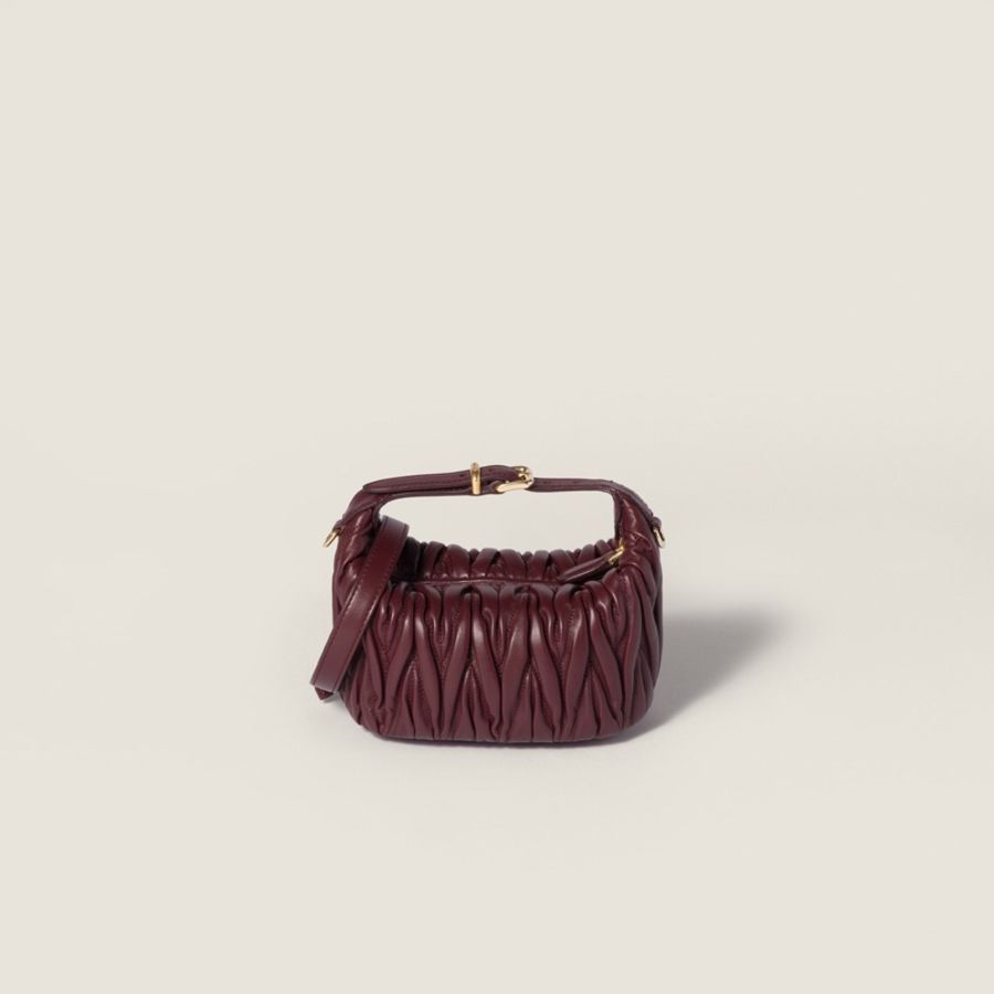 Miu Miu 女士 馬特拉塞凸紋納帕皮手拿包均碼碼15cm*8cm*8.5cm-1