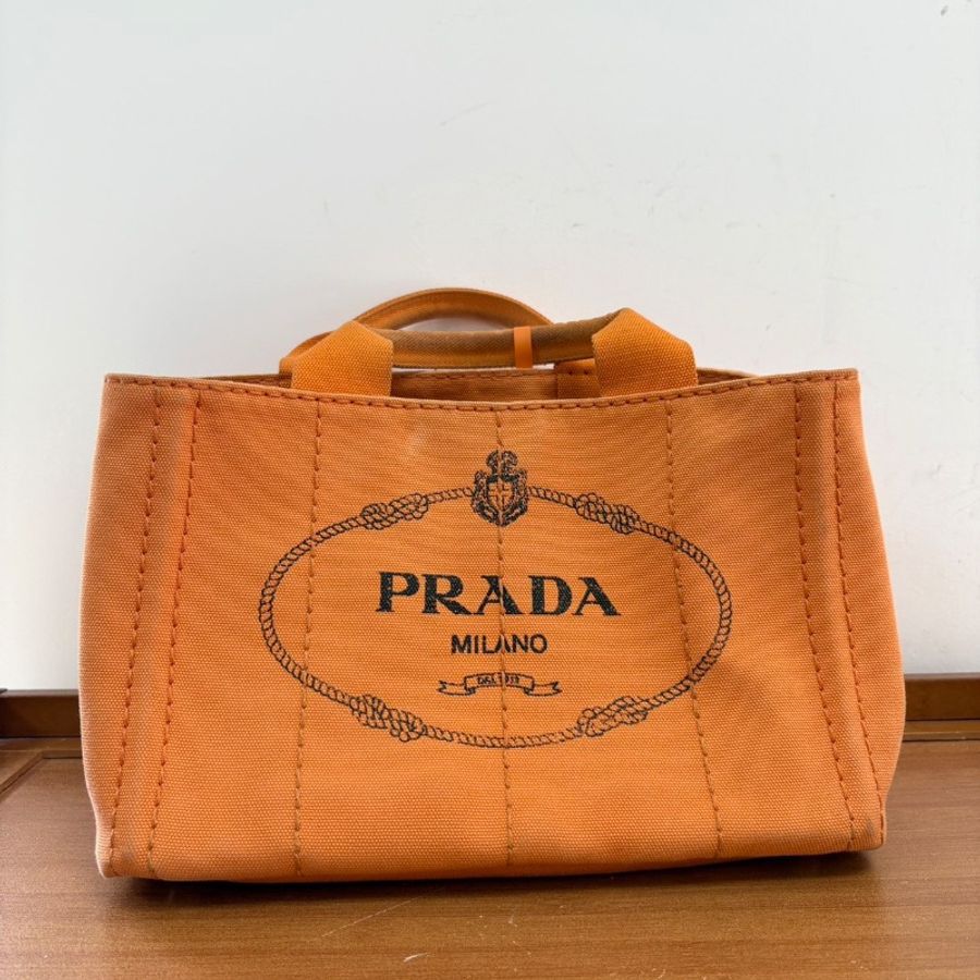 Prada 沙灘包橙色手提包 29*18.5 98新配件塵袋-1