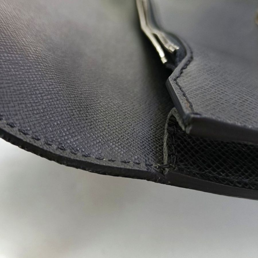 LOUIS VUITTON MINUTO黑色牛皮手拿包銀色五金-8