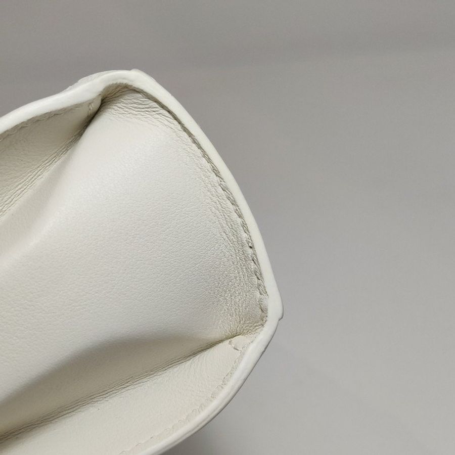 Delvaux Tempete小號牛皮純色浮雕圖騰T形翻蓋手提包單肩包-14