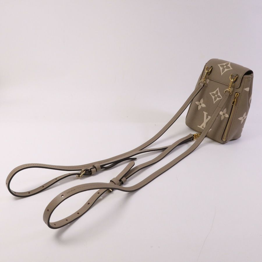 LOUIS VUITTON Monogram Empreinte Tiny金扣背包-7