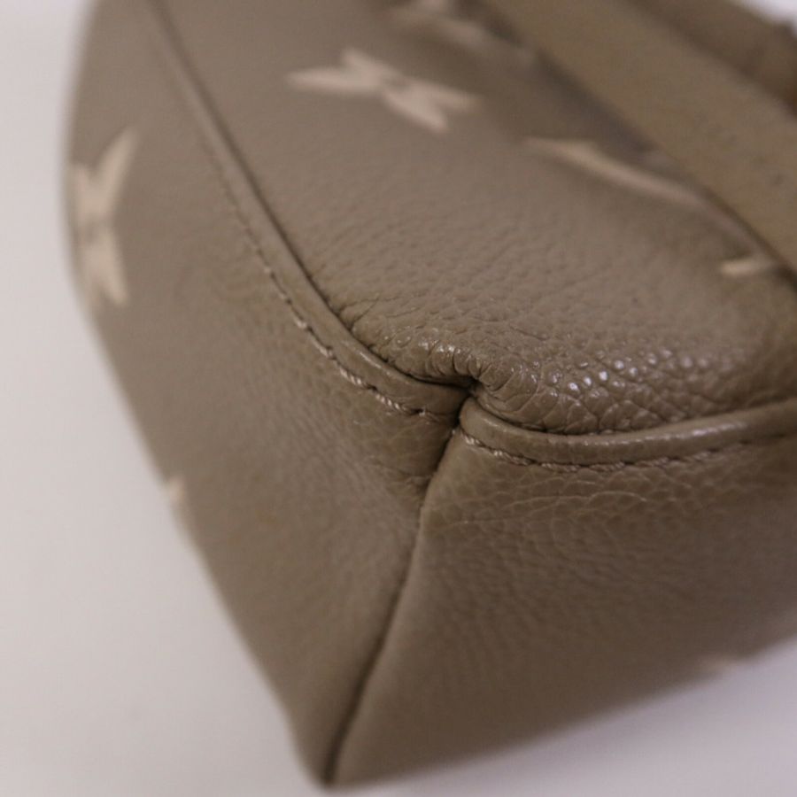 LOUIS VUITTON Monogram Empreinte Tiny金扣背包-11