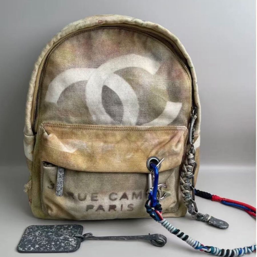 Chanel反戰塗鴉後背包 中古絕版品 米色仿舊28*33*12 98新配件塵袋掛繩-1