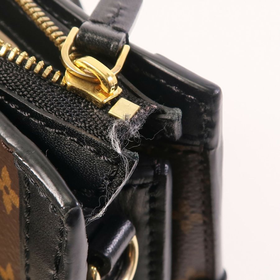 LOUIS VUITTON Monogram Reverse Trunk Clutch金扣肩背袋-14