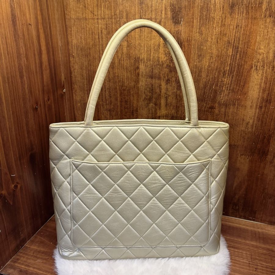 Chanel 金色菱格紋手提包-1
