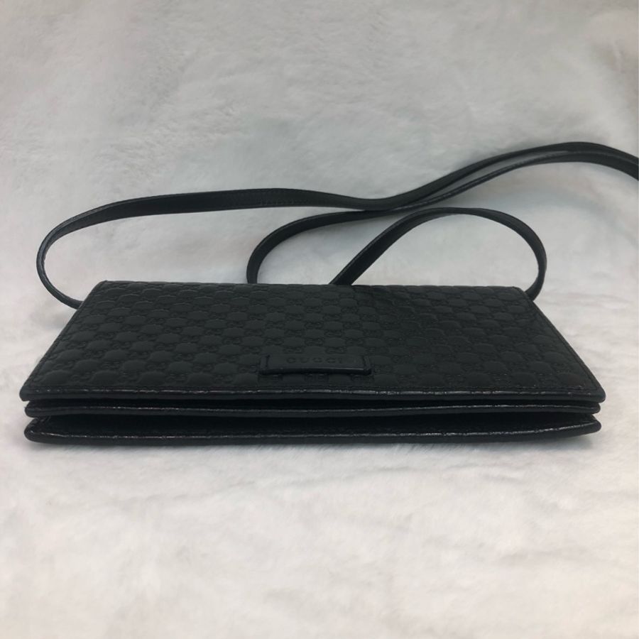 GUCCI 壓紋黑色牛皮細logo WOC XB724-10