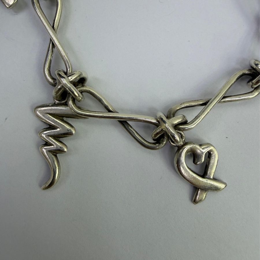 這款手鍊是Tiffany & Co. 的Paloma Picasso Bird motif 手鍊。-6