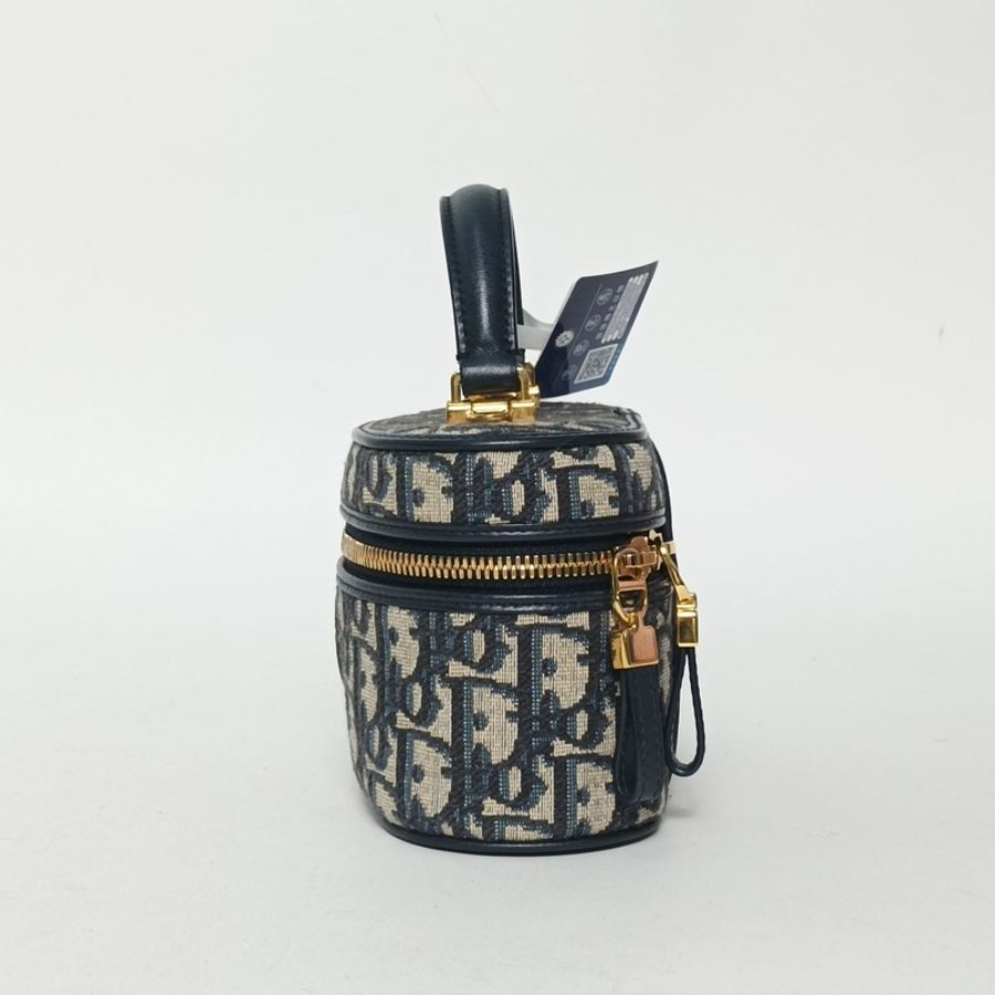 DIOR 墨藍色帆布金扣2024carovanity化妝包肩背包-1