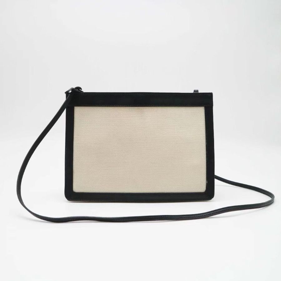 BALENCIAGA Pochette 黑白熊貓拼色 帆布拼皮 信封包26*19 9新 配件塵袋-2