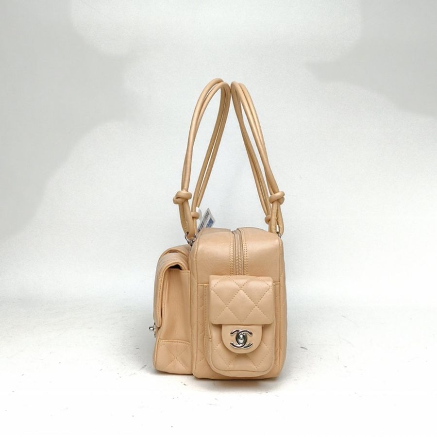 CHANEL 奶茶色牛皮10開銀扣中古康鵬機車包小號-1