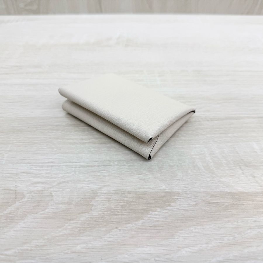HERMES Nata 奶油白山羊皮Calvin Duo零錢卡包H082977-3