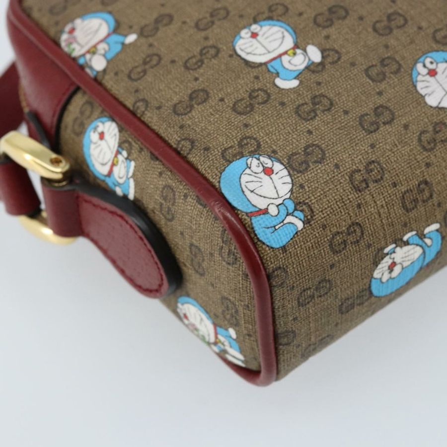 【日本直送】GUCCI Micro GG Supreme哆啦A夢包 PVC 米色 金色 647784 正品 ka3475SAM-15