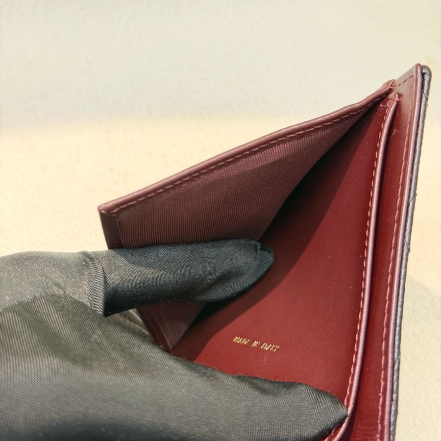 CHANEL 黑金色荔枝牛皮短夾 XC377-17