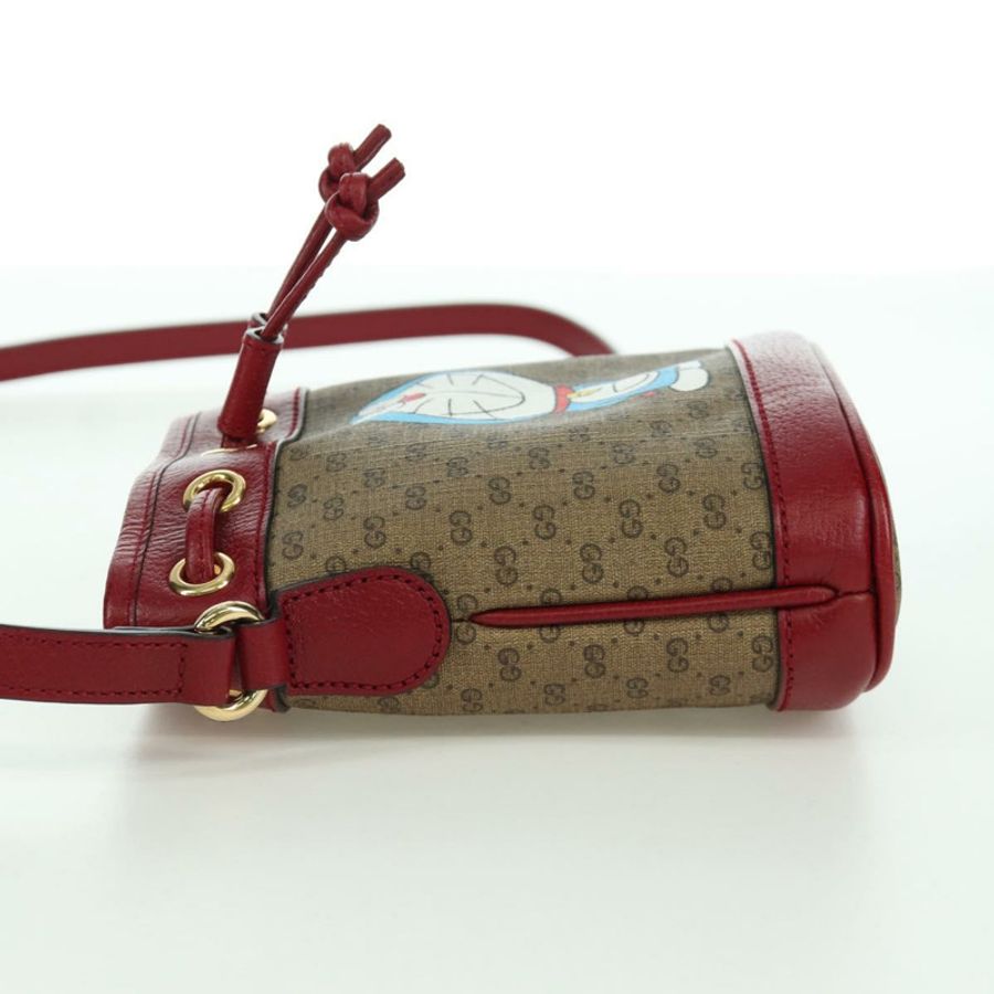 【日本直送】GUCCI GUCCI × Doraemon Micro GG Supreme Bag PVC 米色金色 647801 正品 LNZ389SM-2