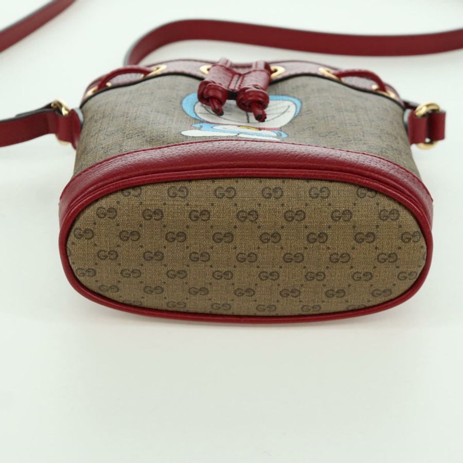 【日本直送】GUCCI GUCCI × Doraemon Micro GG Supreme Bag PVC 米色金色 647801 正品 LNZ389SM-4