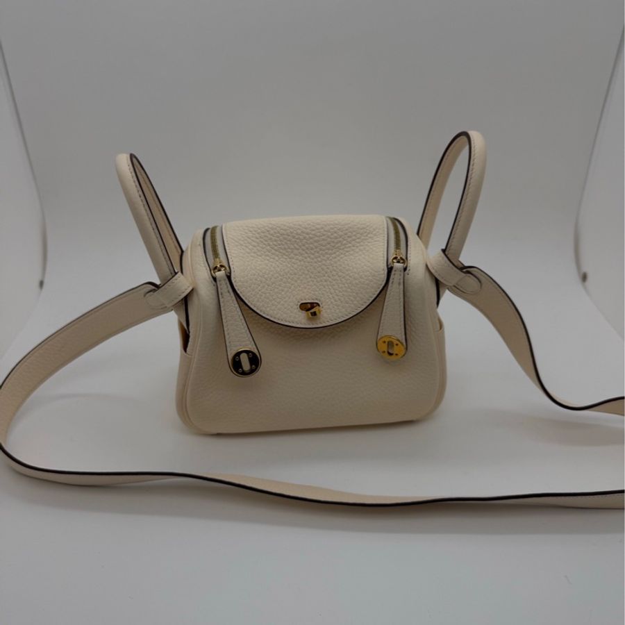Hermes mini Lindy奶油白tc皮金扣z刻,成色如圖,邊角有磨損發黑-0