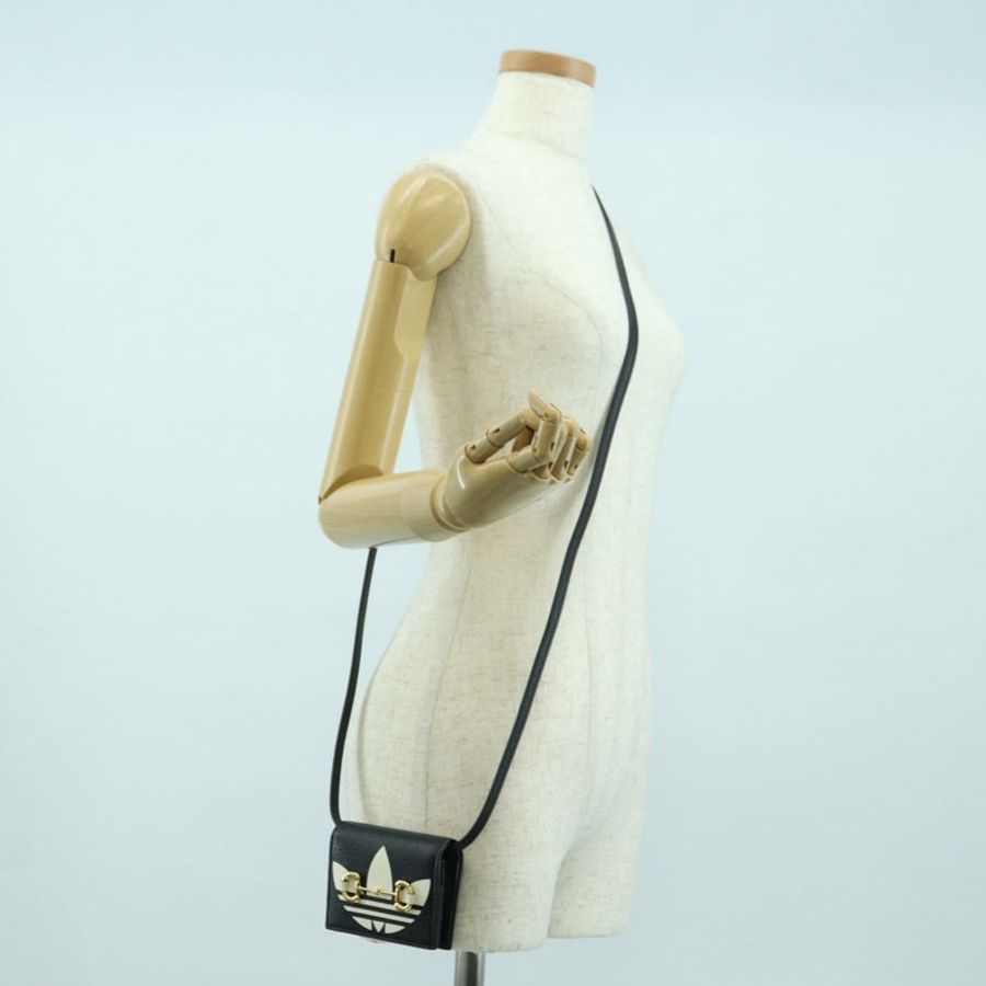 【日本直送】GUCCI 馬銜扣肩挎皮夾 皮革 Adidas 黑色金色 702248 正品 YKZ1233M-25