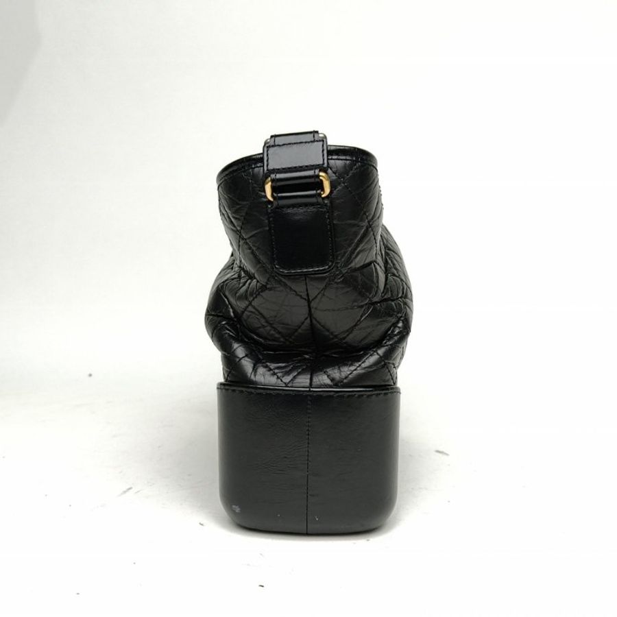 CHANEL GABRIELLE流浪中號黑色牛皮28開金銀扣肩背包-1