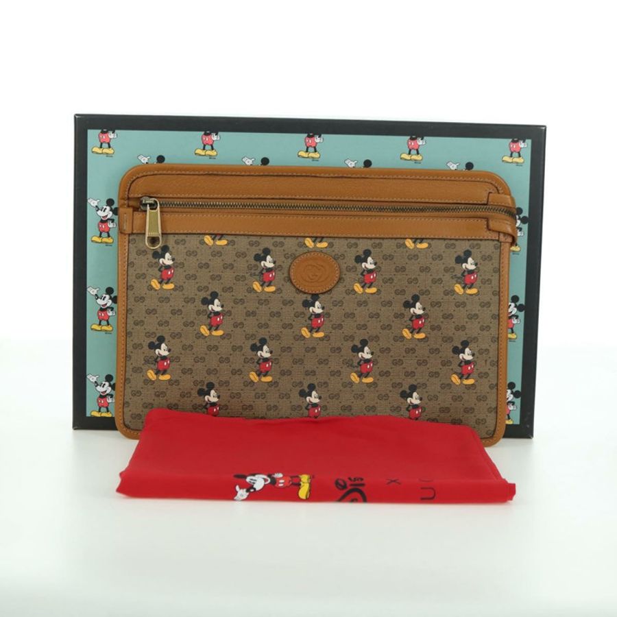 【日本直送】GUCCI GUCCIxDisney GG Supreme 手拿包 PVC 米色金色 602552 正品 YKZ1330M-11