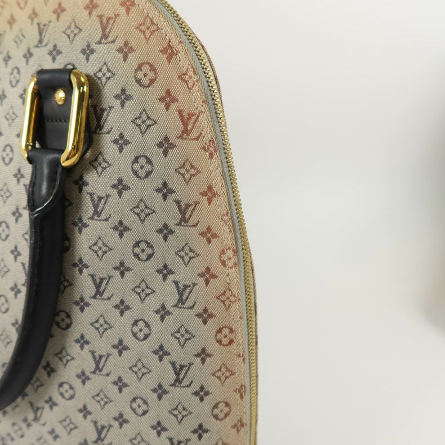LOUIS VUITTON Monogram Mini Lin Alma Haut金扣手挽袋-16