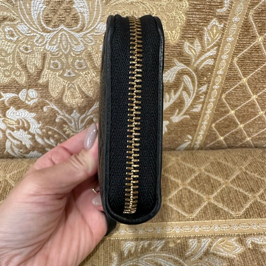 LV 黑牛皮壓紋金釦ㄇ拉零錢包M60574-4