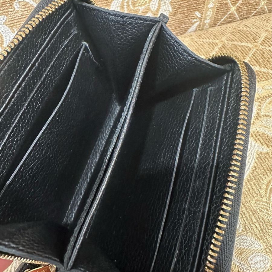 LV 黑牛皮壓紋金釦ㄇ拉零錢包M60574-7