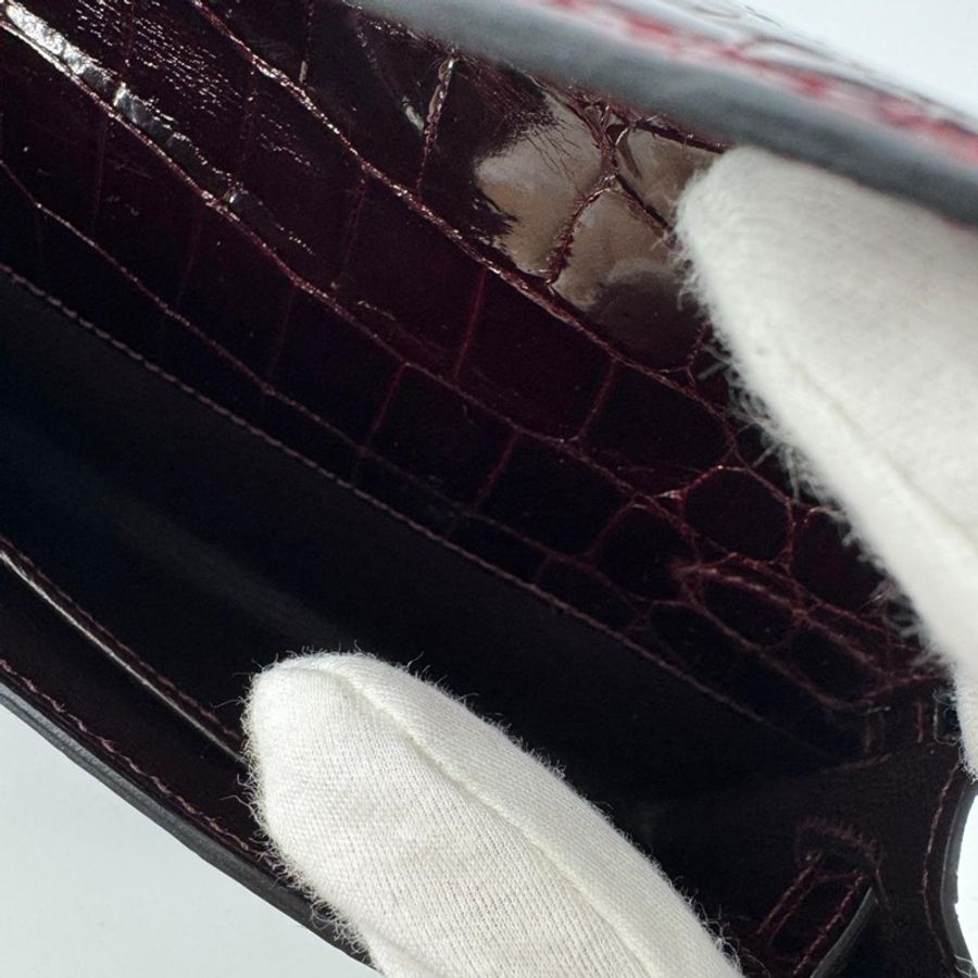 Hermès Kelly Cut Bag in Bordeaux Shiny Porosus Crocodile Leather with PHW-17