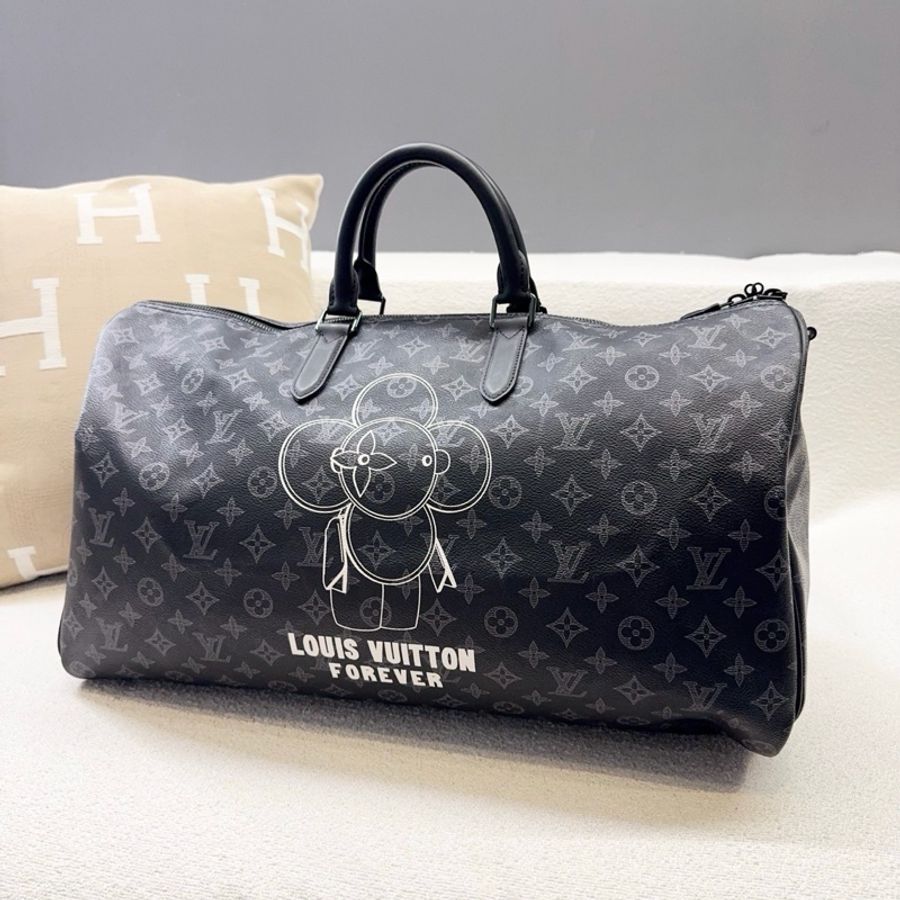 Louis Vuitton • 限量Vivienne太陽花全皮壓紋Keepall 50-3