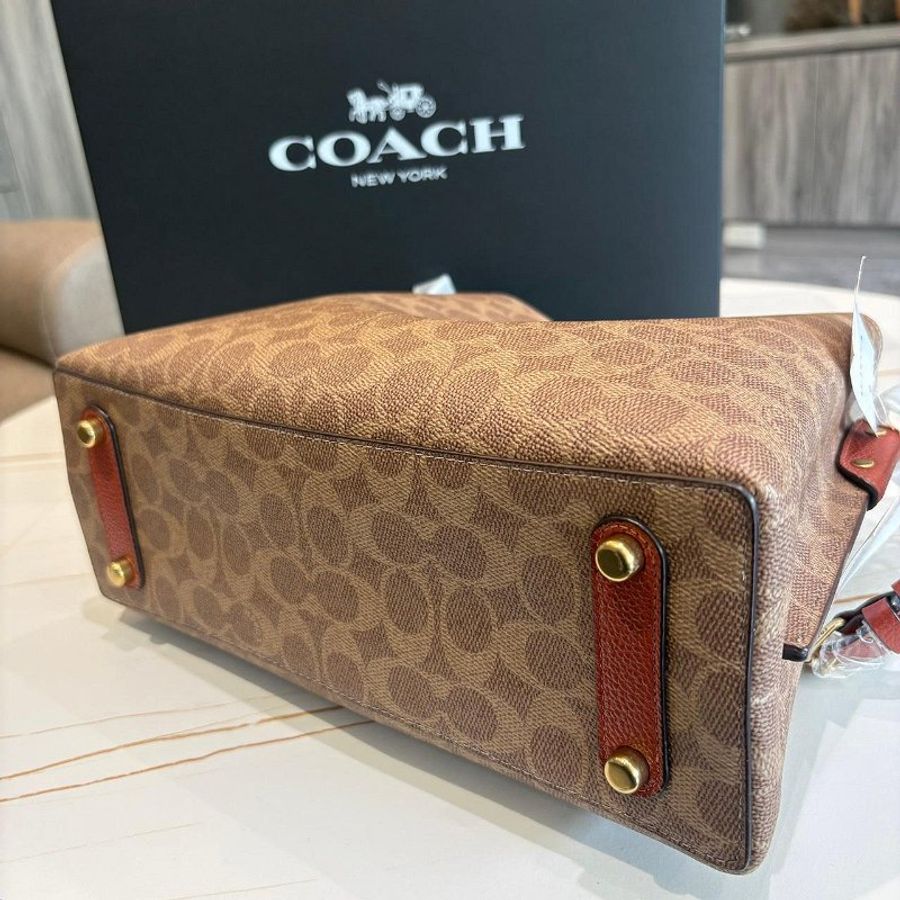 COACH 老花塗層帆布印花肩背袋-1